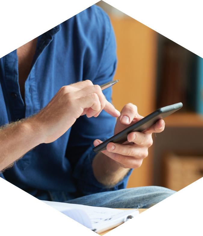 man clicking on phone